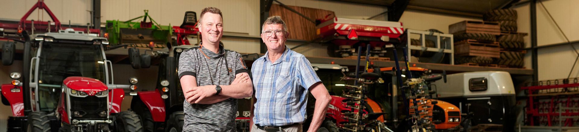 Antoine Eising and partner with tractors