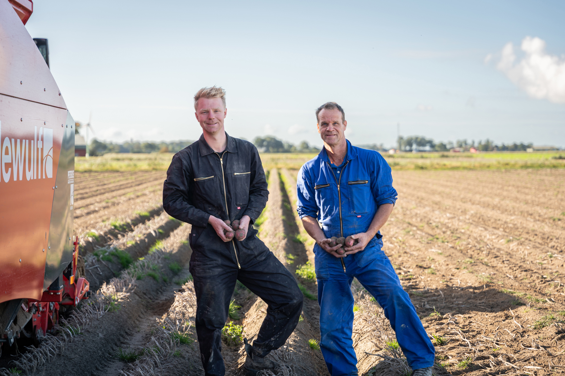 Two growers in potato field